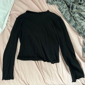 Long sleeve black shirt. Just bought it but it’s short on me but good condition.